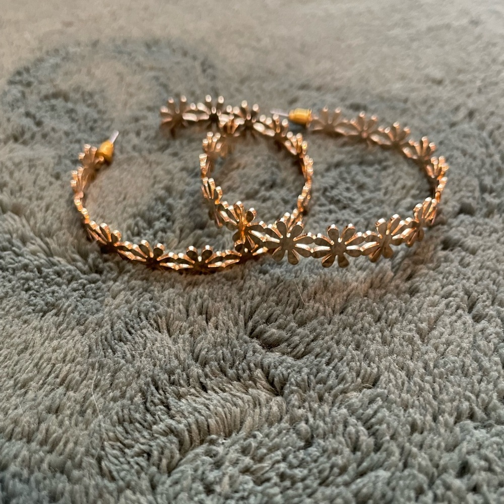 Gold flower hoop earrings